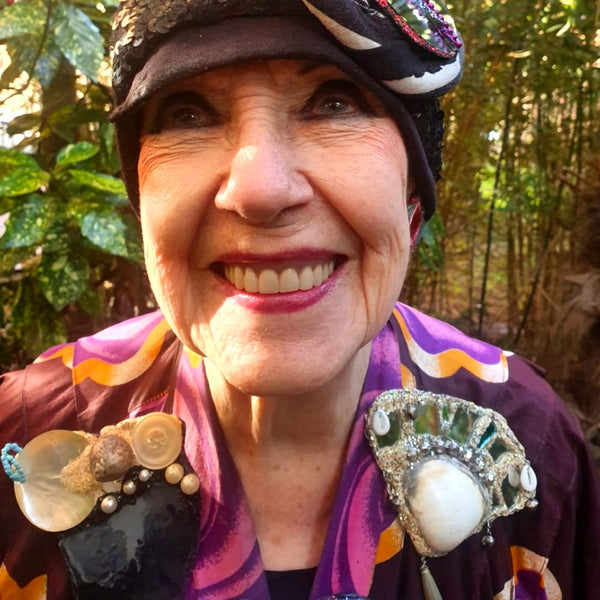 Molly Parkin wearing the Puri Power Stone brooch